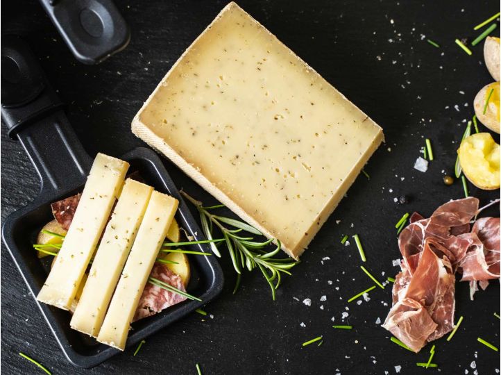 Raclettekäse | Bergkräuter | Allgäuer Rohmilchkäse